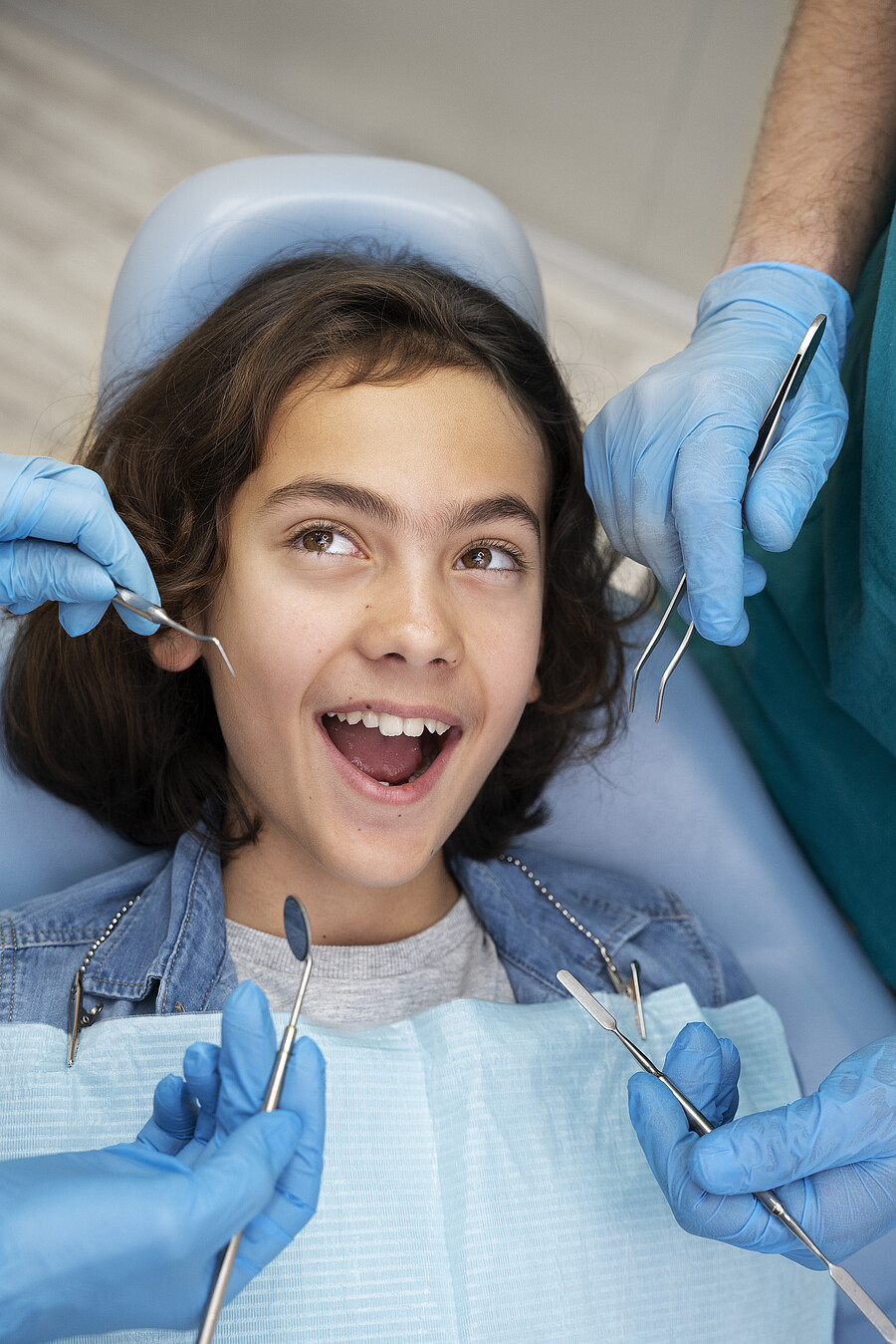 close up boy dentist