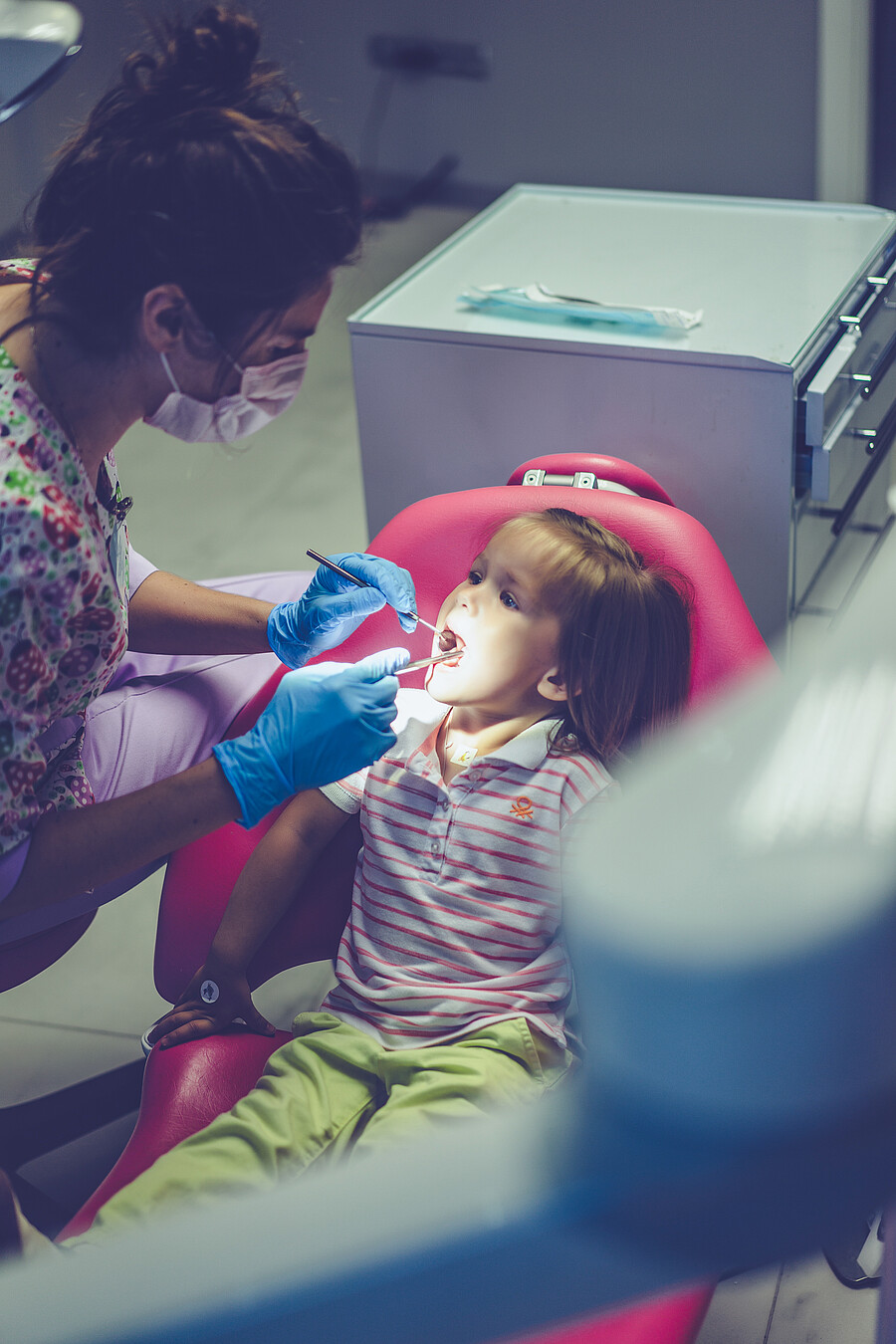 assistant, baby, beautiful, boy, care, chair, checkup, child, childhood, clinic, dental, dentist, dentistry, dentists, doctor, drill, equipment, examination, female, girl, happy, health, healthcare, hospital, hygiene, indoors, instrument, kid, little, looking, medicine, mirror, mouth, office, oral, patient, pediatric, pedodontics, procedure, professional, sitting, smile, stomatology, teeth, tooth, treatment, uniform, visit, white, young